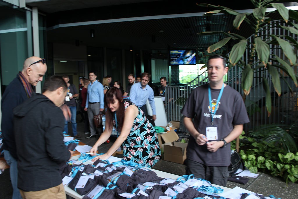 Volunteers manning the registration table at WordCamp Brisbane
